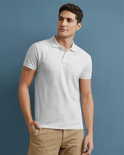 Front Facing Polo Shirt Mockup Man Wearing White Tee Against Minimal Blue Background Neutral Pose