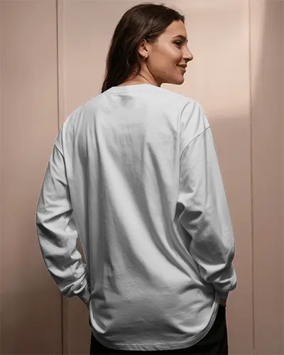 Long Sleeve Back Tshirt Mockup Female Model Smiling In Soft Shadowed Indoor Lighting