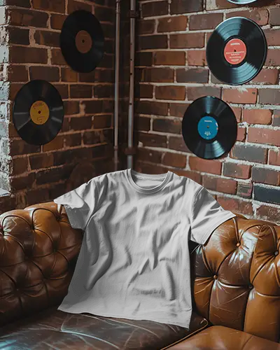 Retro Lounge T Shirt Mockup On Leather Sofa Against Brick Wall With Mounted Vinyl Records