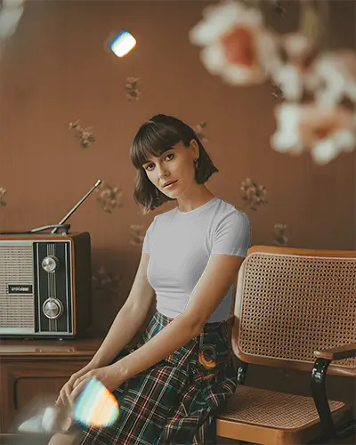 Nostalgic Room Tshirt Mockup Young Woman In Plaid Skirt Sitting By Old Radio In Soft Light 02025