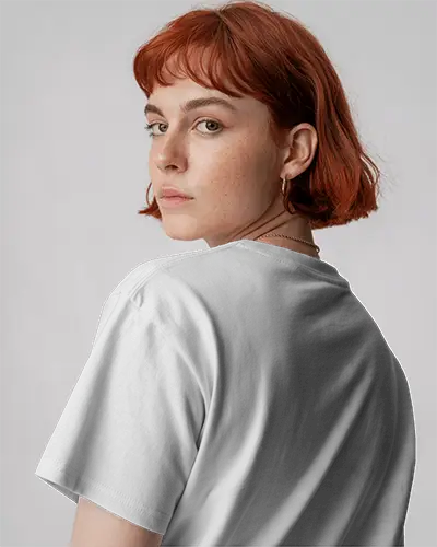 Back View White Tshirt Mockup Woman With Red Bob Cut And Neutral Studio Background 02043