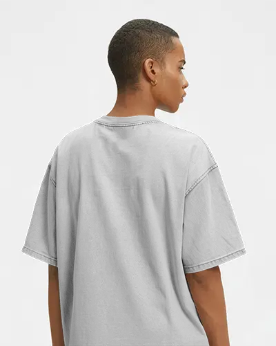 Clean Backside Acid Wash T Shirt Mockup Woman Facing Left In Minimal Setup With Soft Lighting