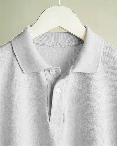 Closeup Polo Shirt Mockup Button Collar Design Hanging On Wooden Hanger In Soft Light