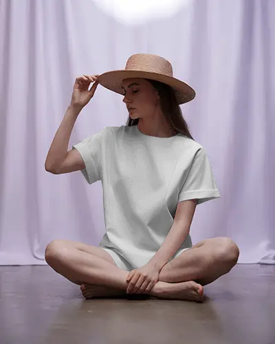 Fashion T Shirt Mockup Female Model In Summer Hat On Polished Floor With Curtained Backdrop