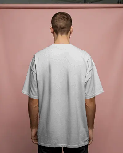 Back View Tshirt Mockup Male Model Standing Against Pastel Pink Studio Background