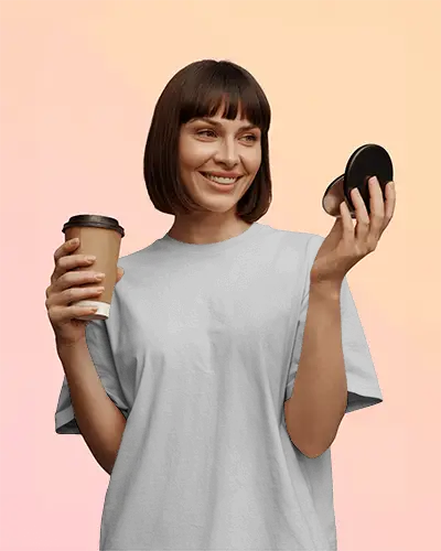 Cheerful Tshirt Mockup Female Model Smiling With Coffee And Makeup Compact In Hand