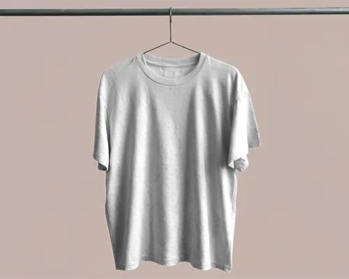 Minimalist T Shirt Mockup Hanging On Pipe Against Muted Neutral Pink Background