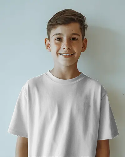Happy Boy In T Shirt Mockup With Freckles Standing Against Light Blue Background Smiling