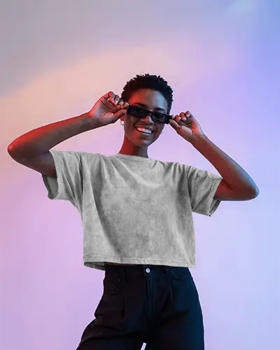 Neon Styled Cropped T Shirt Mockup Model Smiling In Jeans And Glasses