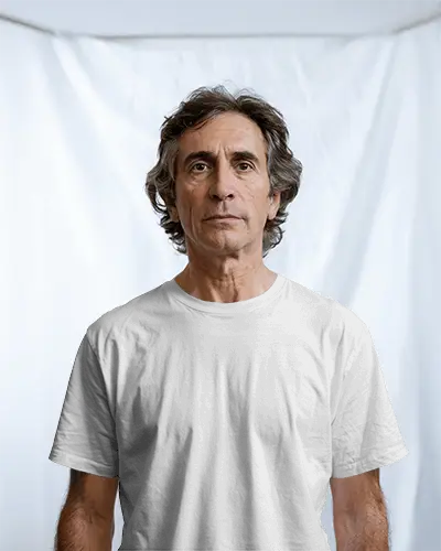 Senior Male Model T Shirt Mockup Front Facing Shot On White Draped Studio Background