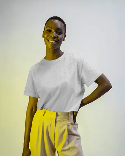 Vibrant Smile T Shirt Mockup Female Model Posing With Yellow Toned Light On Neutral Backdrop