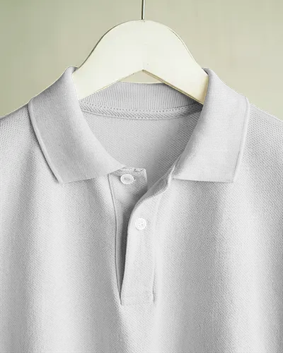 Close Up Polo Shirt Mockup On Wooden Hanger With Textured Fabric And Minimal Background