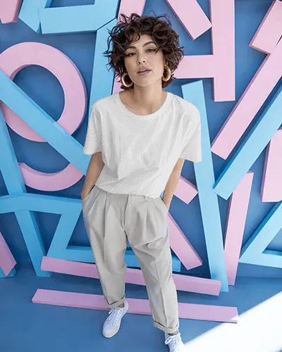 t-shirt-mockup-confident-woman-posing-against-colorful-geometric-pastel-blue-wall-art