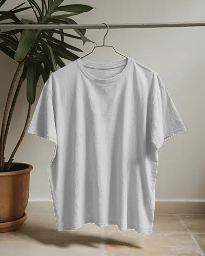 t-shirt-mockup-hanging-on-metal-rod-with-potted-plant-in-natural-light-minimal-studio
