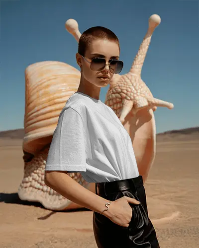 avant-garde-look-t-shirt-mockup-strong-pose-in-surreal-artscape-with-giant-snail