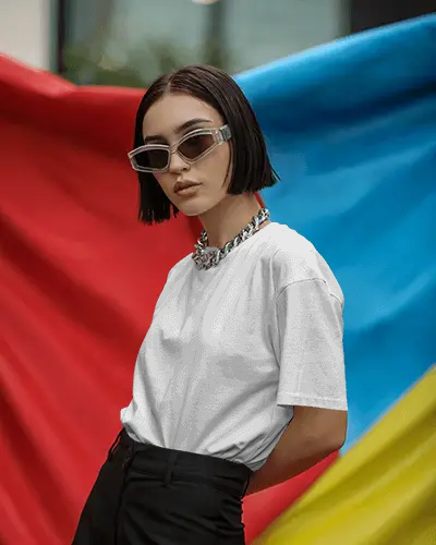 high-fashion-t-shirt-showcase-on-model-with-metallic-accessories-and-colorful-background