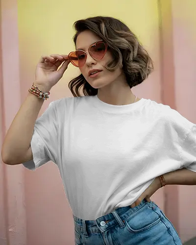fashionable-woman-tshirt-mockup-posing-in-heart-sunglasses-with-pastel-colored-wall