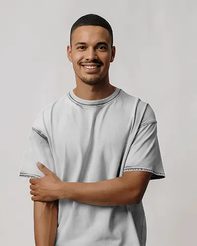 smiling-man-tshirt-mockup-studio-shot-on-plain-background-with-casual-arm-fold-pose