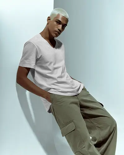 minimal-vneck-tshirt-mockup-blonde-model-posing-in-light-studio-modern-streetwear-look