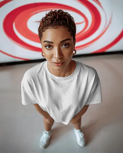 Urban Pop Style Tshirt Mockup High View Female Model In Artistic Surrounding Space