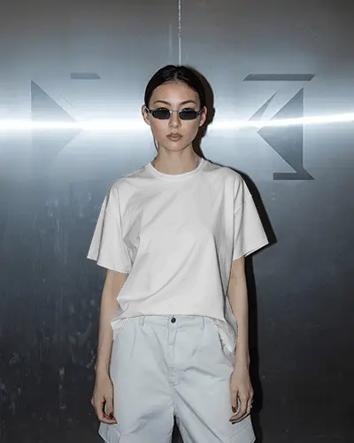 Urban Tshirt Mockup Asian Female Model Sunglasses White Pants Metallic Wall Setting