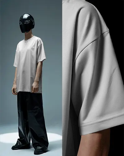 futuristic-t-shirt-mockup-male-model-in-black-helmet-with-closeup-sleeve-detail