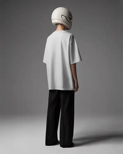 minimal-back-view-tshirt-mockup-male-model-in-white-helmet-and-black-pants-on-grey-studio