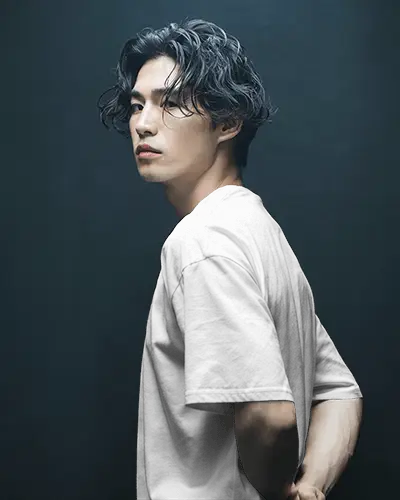 side-profile-tshirt-mockup-male-model-moody-dark-background-modern-streetwear-editorial-style