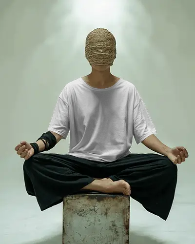 artistic-meditation-tshirt-mockup-male-model-with-woven-face-cover-in-zen-pose-on-stool