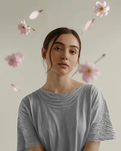 floral-falling-tshirt-mockup-female-model-soft-expression-nature-inspired-aesthetic