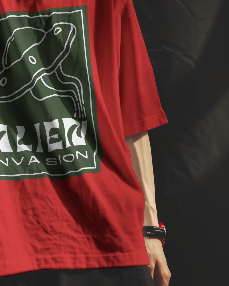 Asian Man Wearing Tshirt Mockup With Red Curtain Flying In Background Scene4