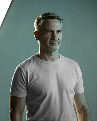 modern-casual-t-shirt-mockup-older-male-model-studio-lighting-clean-professional-look