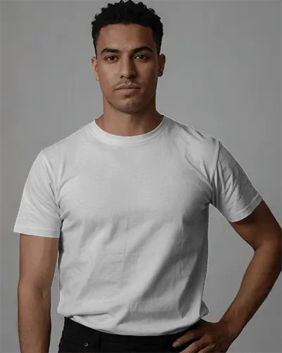 Modern Fit T Shirt Mockup Male Model Front View Hand On Hip Against Soft Light Background