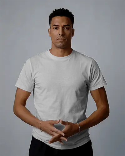 Sharp Look T Shirt Mockup Male Model Front Facing Hands Together Clean Studio Minimal Vibe