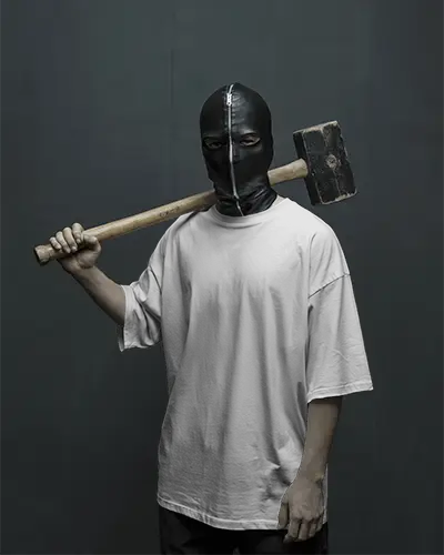 Dark Gritty Tshirt Mockup Male Model In Black Mask Holding Hammer Industrial Mystery Vibe