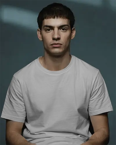 Seated Front T Shirt Mockup On Dark Backdrop Simple Style Clean Design With Modern Vibes