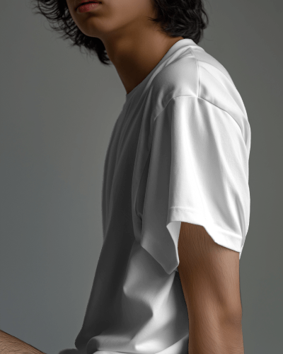 Asian Model Wearing Tshirt Mockup In Neutral Studio Background Scene2