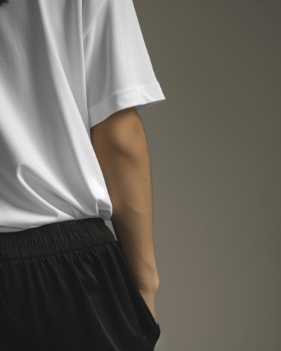 Asian Model Wearing Tshirt Mockup In Neutral Studio Background Scene1