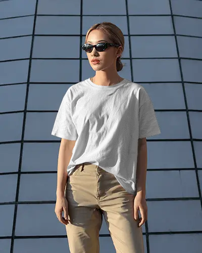 Minimalist T Shirt Mockup Woman In Casual Wearing Sunglasses Against Architectural Grid Backdrop