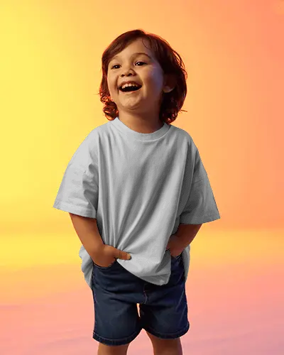 Cheerful Child T Shirt Mockup Young Boy Laughing In Casual Outfit Colorful Backdrop Scene