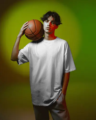 Athletic T Shirt Mockup Male Model Holding Basketball In Studio With Vibrant Colored Lighting