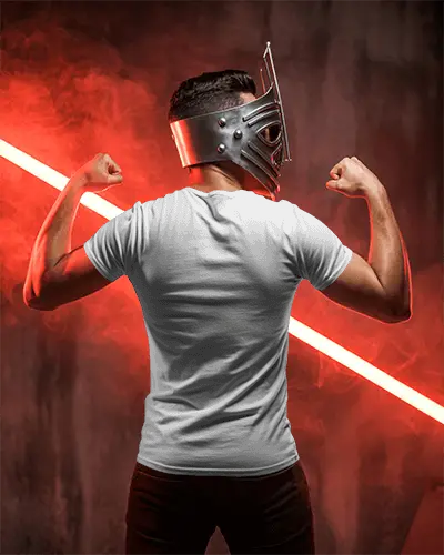 Warrior Inspired T Shirt Mockup Male Model In Metal Helmet Flexing Under Red Neon Light