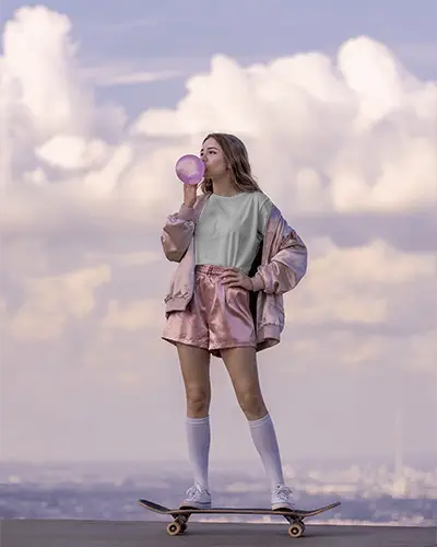 Urban Skater Tshirt Mockup Female Model In Pink Outfit Chewing Gum On Skateboard Outdoors