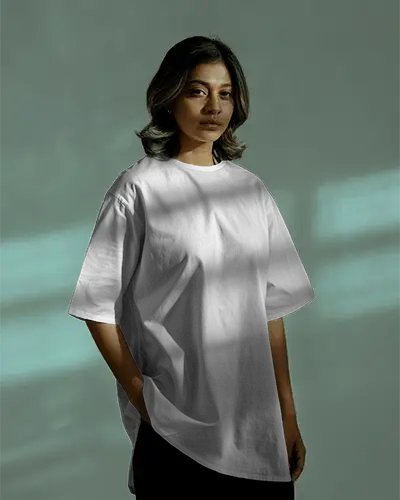 Moody Window Light Tshirt Mockup Female Model Standing Casual Expression Soft Shadow Play