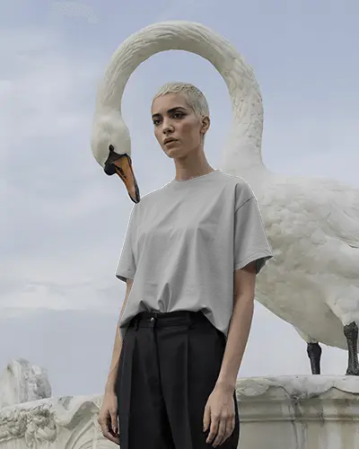 Surreal Tshirt Mockup Female Model Standing With White Swan In Outdoor Setting