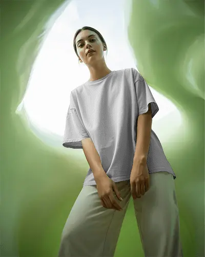 Minimal Studio T Shirt Mockup Female Model Looking Up In Soft Green Light Modern Style