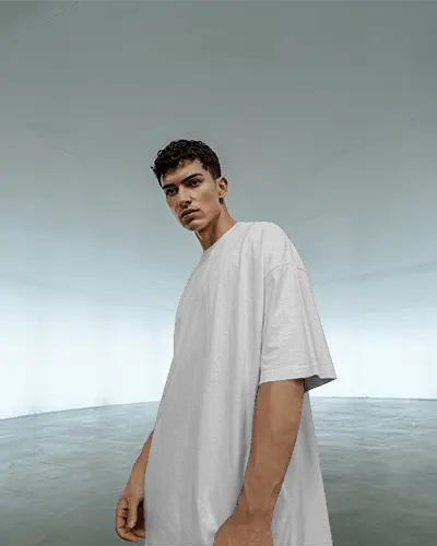 Futuristic Room T Shirt Mockup Man Standing In Spacious Light Environment