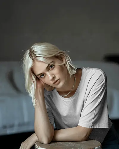 Moody Interior Tshirt Mockup Female Model With Blonde Hair In Soft Natural Light