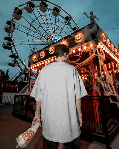 Eerie Halloween Festival Carnival Dressed Up Man Enjoying Scary Decorations And Ferris Wheel