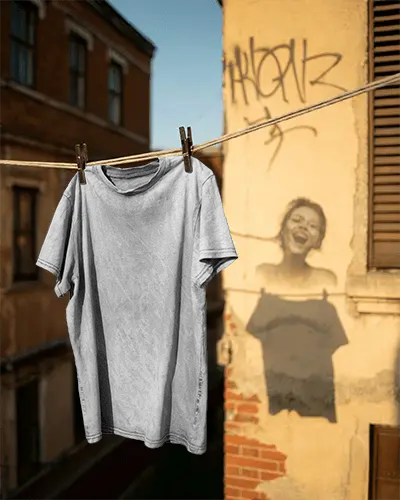 Urban Street Style Blank T Shirt Mockup Hanging On Clothesline In City Backdrop